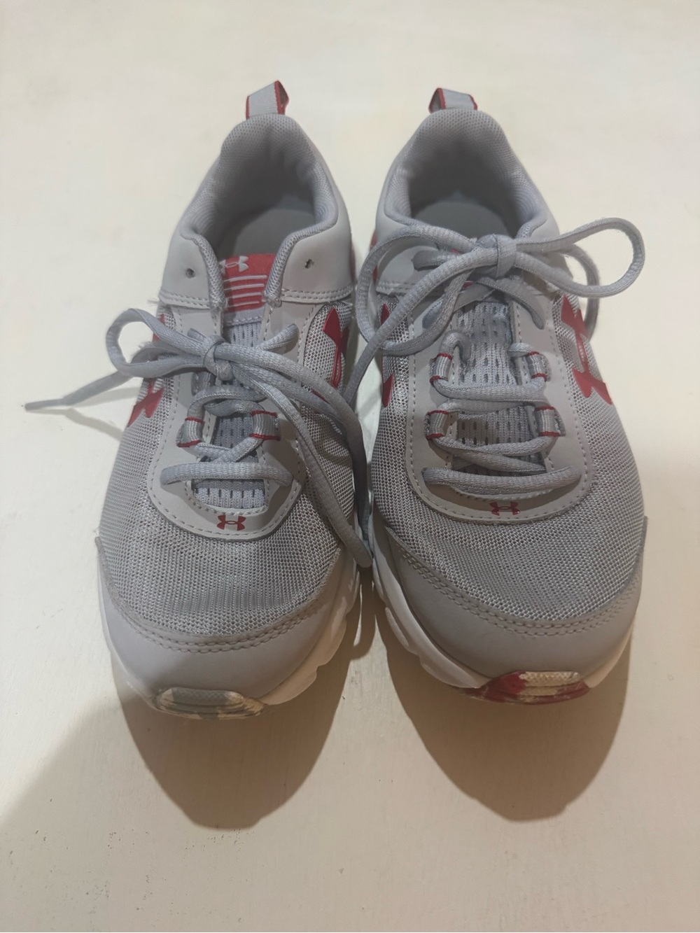 Under Armour Kids Gray Sneakers with Pink Accents